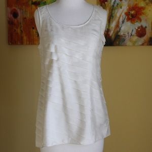 cream colored silk sleeveless top